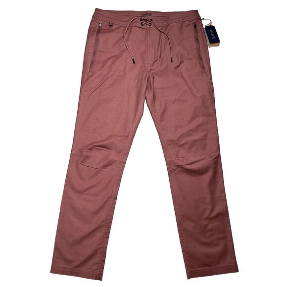NWT Roark Layover 2.0 Travel Utility Pants Mens 33 Russet Orange Commuter Hiking - Picture 1 of 16